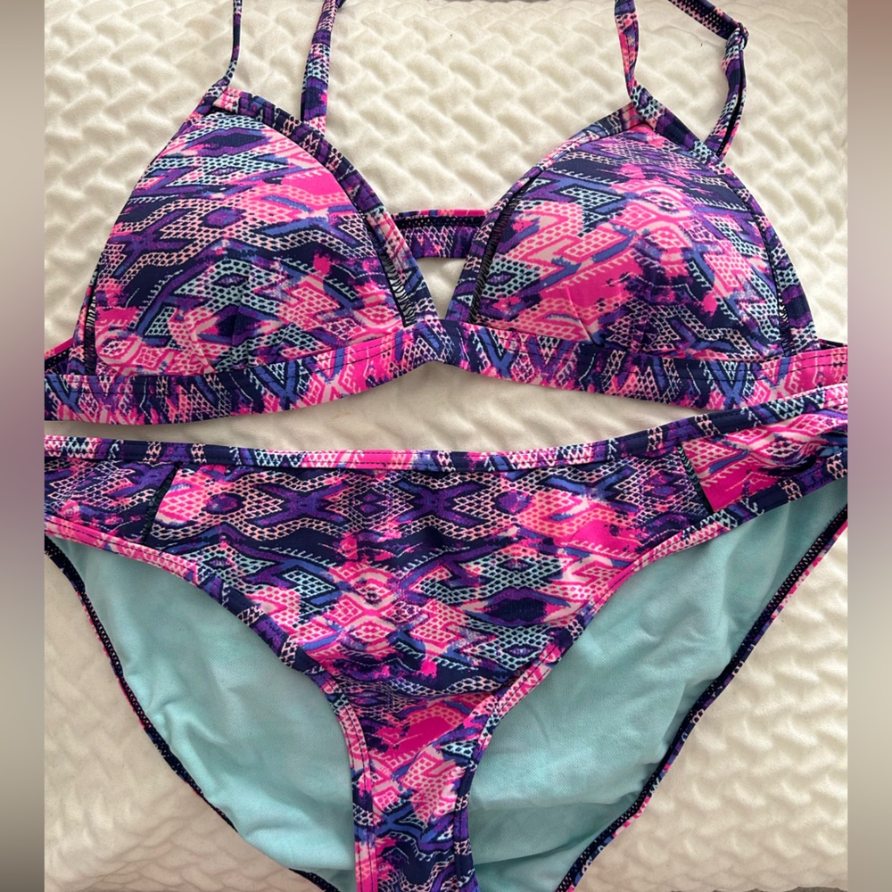 Ardene colourful swimsuit for teens size medium.